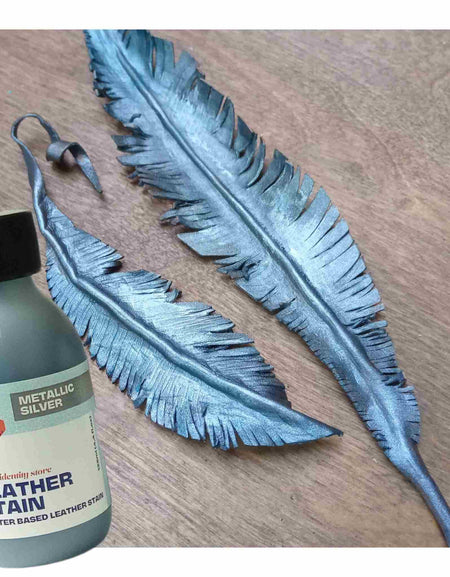 Identity Water Based Leather Stain in Silver used to paint colour a veg tan formed feather for metallic effect