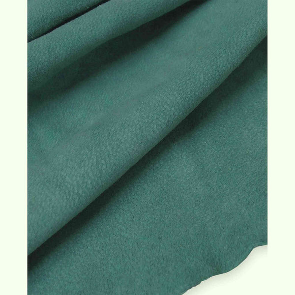 Soft and tactile lightweight suede leather in a muted shade of blue/green teal ideal for garment making, applique, linings