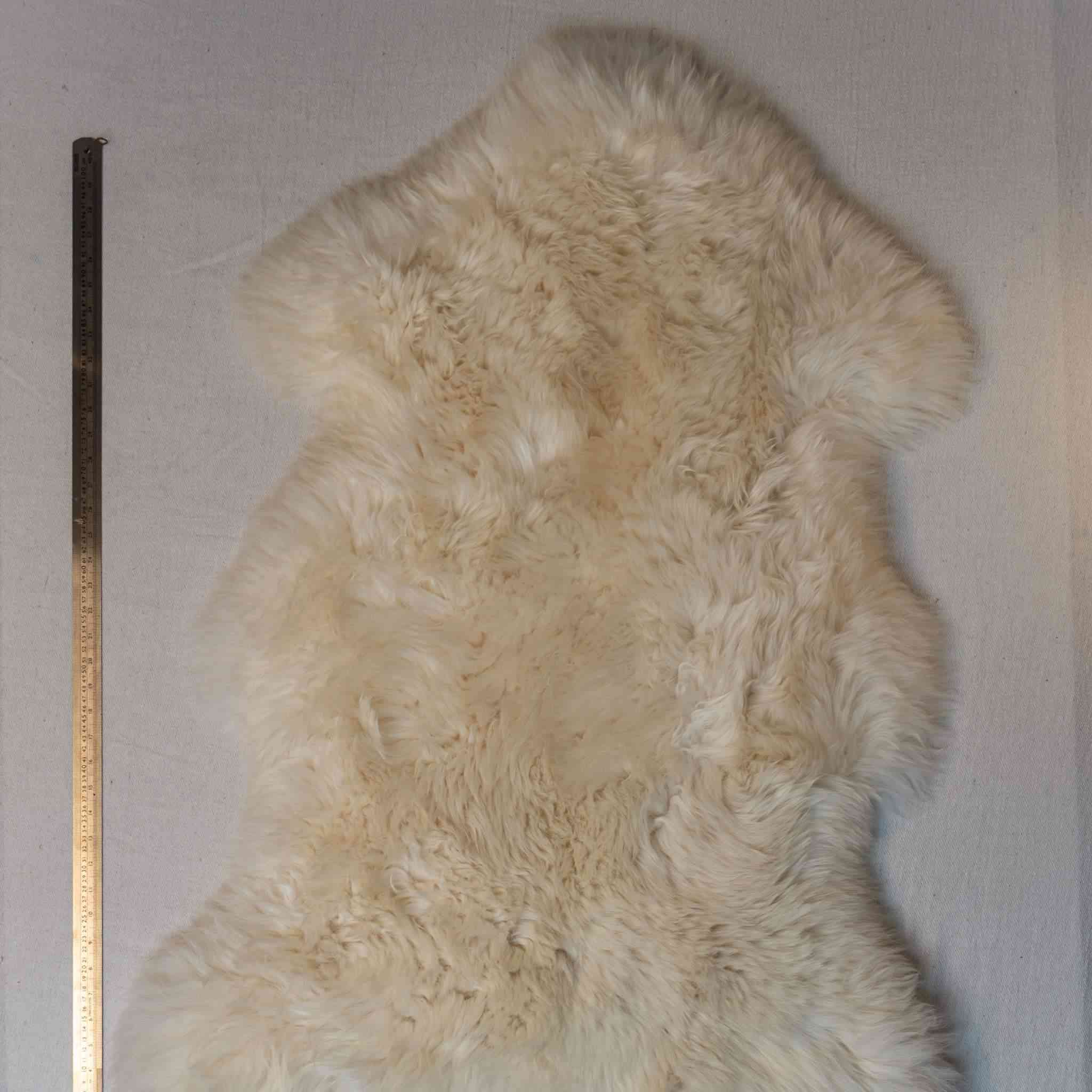 Natural wool sheepskin, large size, premium grade, beautiful and heavy with deep pile and good shape.