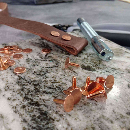 Small version of the traditional leatherwork rivet and burr in copper finish - use for permanent fixings for belts, bags and more
