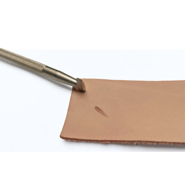 A narrow lined pear shaped stamp for creating depth and shadow. when stamped into vegetable tanned leather, for leathercraft tooling and carving