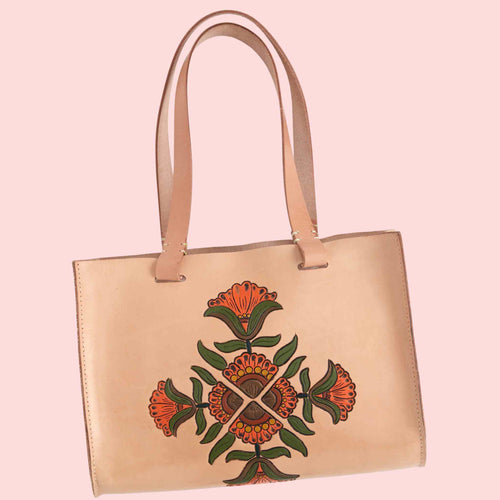 Load image into Gallery viewer, Leather bag with the Art Deco Craftaid designs carved and painted 
