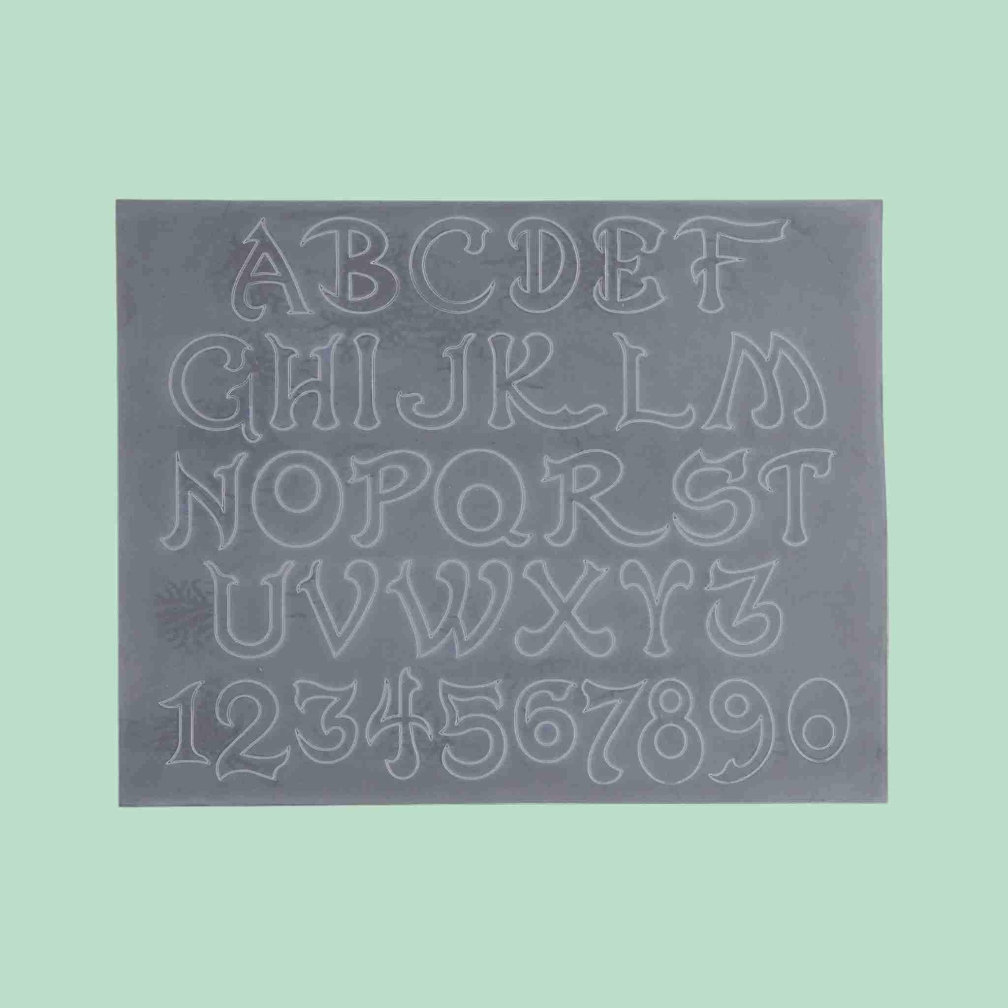 Embossing sheet for transferring patterns to vegetable tanned leather - Nouveau font style alphabet lettering - stylised outlines that can be decorated with score lines, swivel knife cuts and craftools.