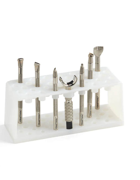 The basic starter kit for leathercraft carving tooling leather, including the standard 6 piece craftools, a swivel knife and an acrylic storage rack holder.