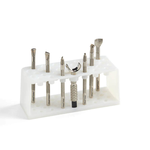 The basic starter kit for leathercraft carving tooling leather, including the standard 6 piece craftools, a swivel knife and an acrylic storage rack holder.