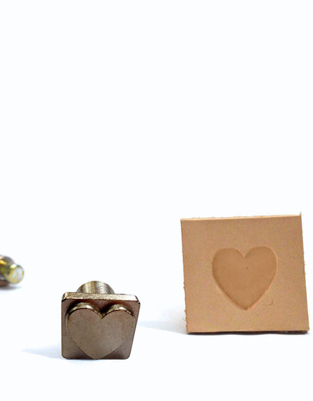 Recessed Heart mini stamp made from cast metal that leaves a sharp clear impression when stamped into dampened vegetable tanned leather. 