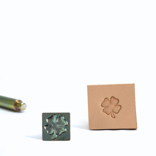 Load image into Gallery viewer, Four Leafed Clover mini 3D stamp is a small cast metal stamp that leaves a sharp clear impression when stamped into dampened vegetable tanned leather
