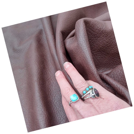 Brown embossed grain cowhide leather in small craft cuts A3