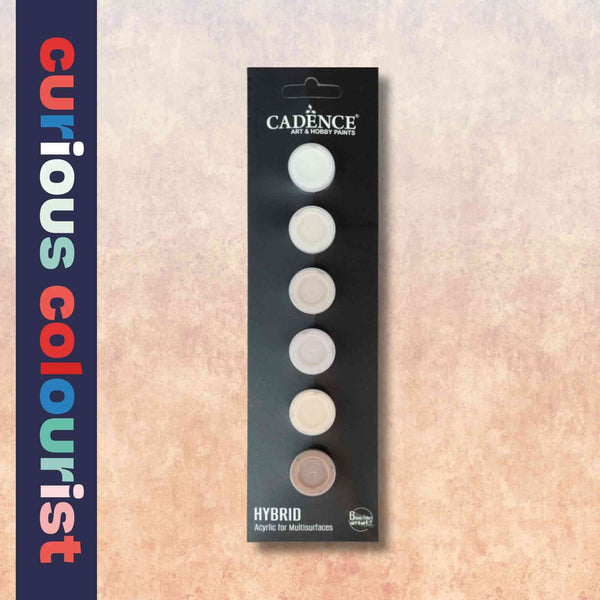 Curated Colour collection of small paint pots in soft browns and creams