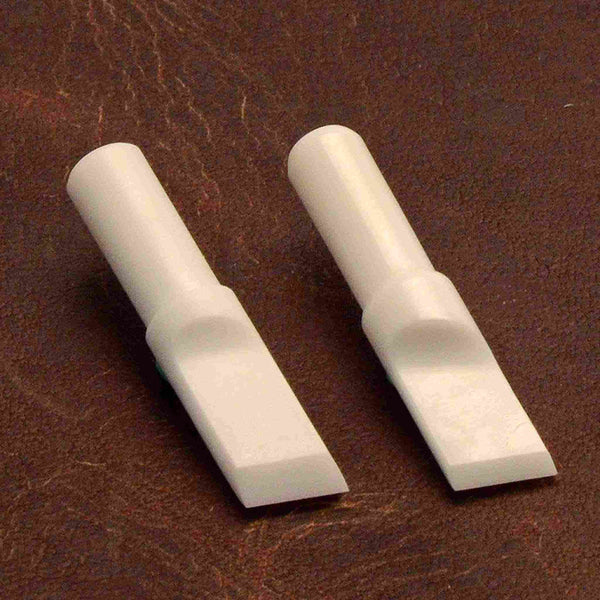 Made from hard ceramic that stays very sharp, these blades will give a professional finish and glide through the leather. They should never need sharpening just an occasional strop. 6.3mm, 1/4" blade width. Will fit any of our swivel knives.