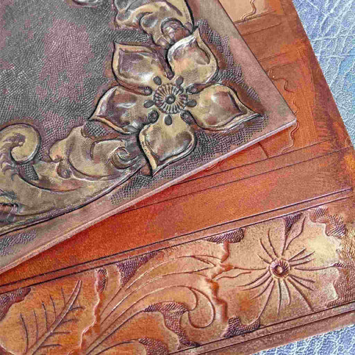 Load image into Gallery viewer, Image to show finger wax gold on embossed and carved leather
