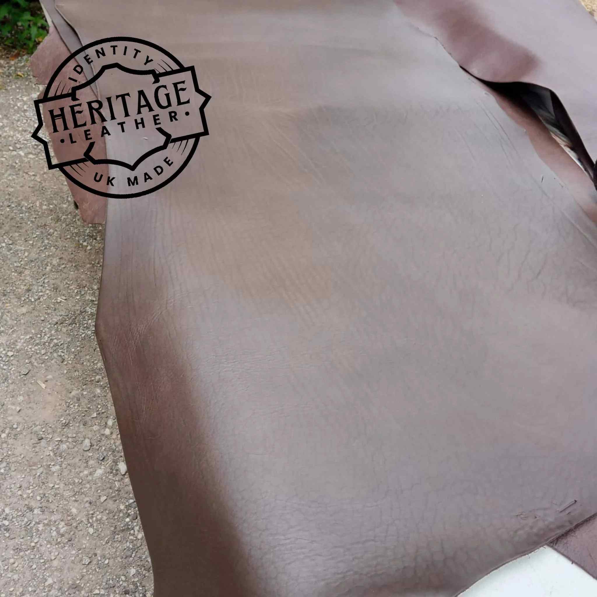softer mellow type cowhide type leather in butts or short backs. Long lengths, a dark Bourneville Brown in colour.