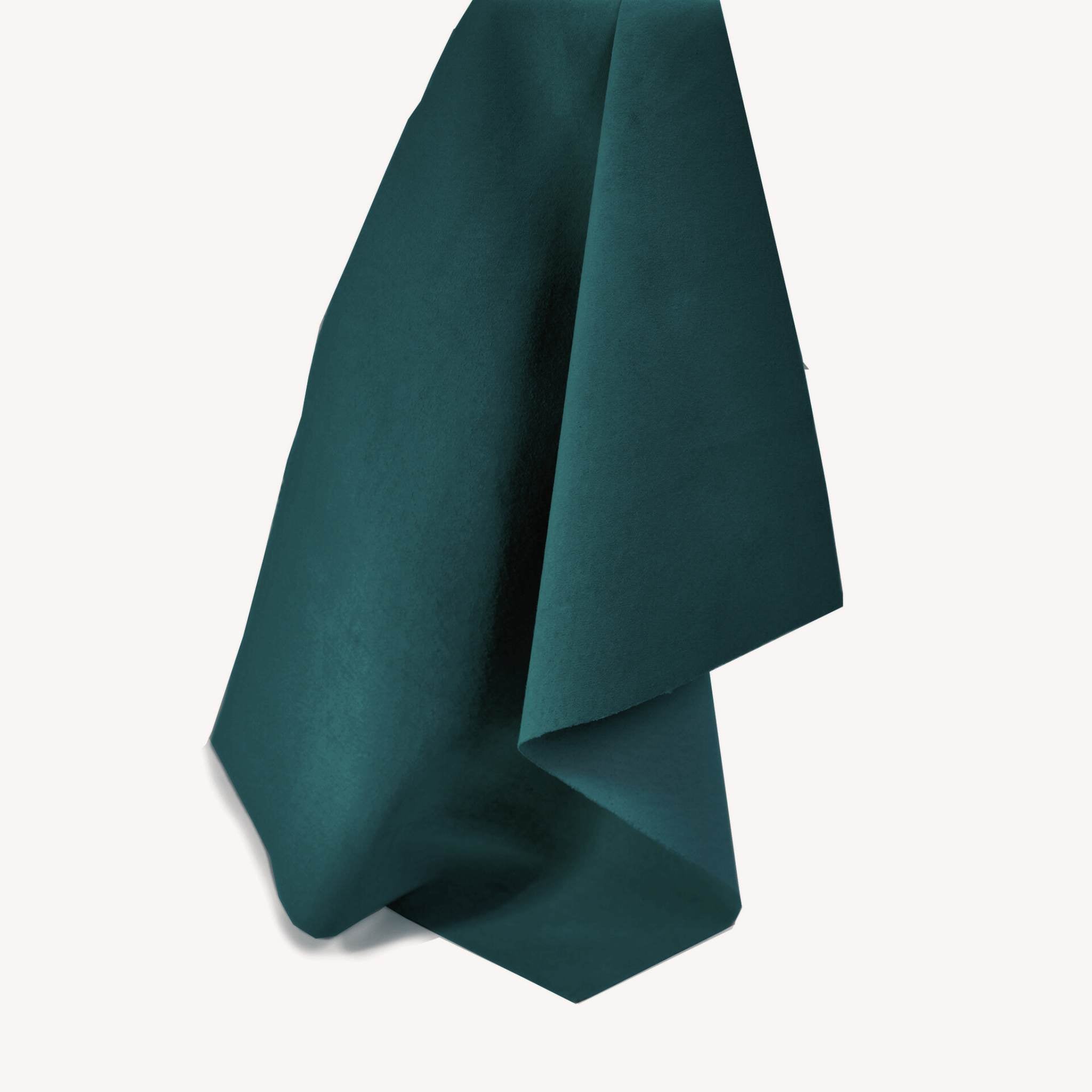 Soft and tactile lightweight suede leather in a muted shade of blue/green teal ideal for garment making, applique, linings