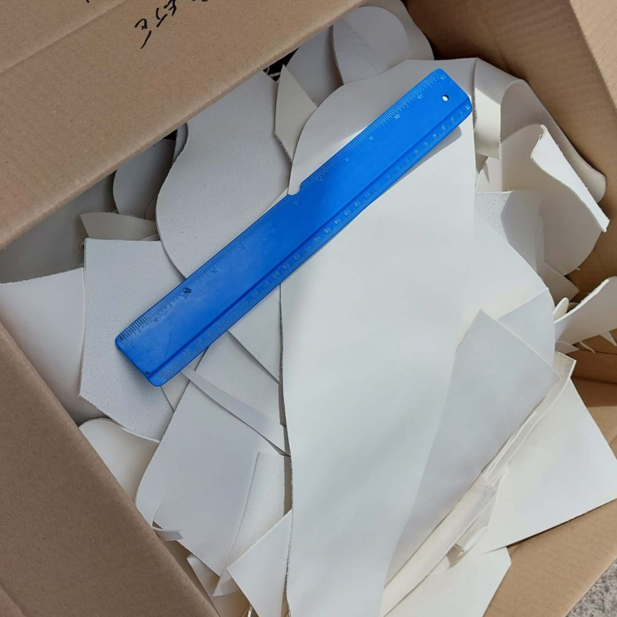 Large box of unsorted Light Weight Cream White Calf Craft Pieces, (vegetable tanned) sustainably and environmentally sourced leather with a light base ideal for creating bright colours and other surface decoration.