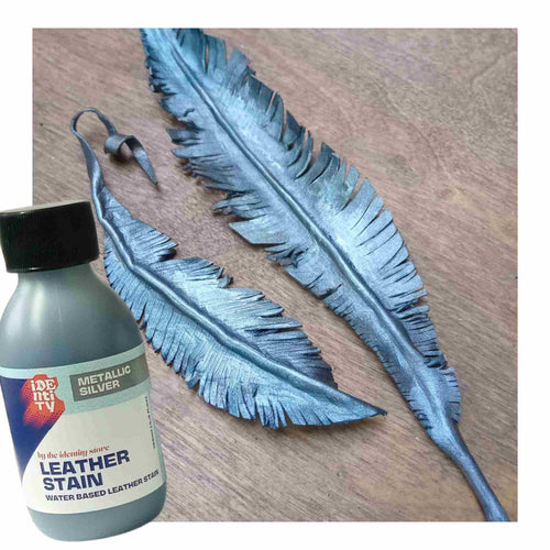 Load image into Gallery viewer, Identity Water Based Leather Stain in Silver used to paint colour a veg tan formed feather for metallic effect
