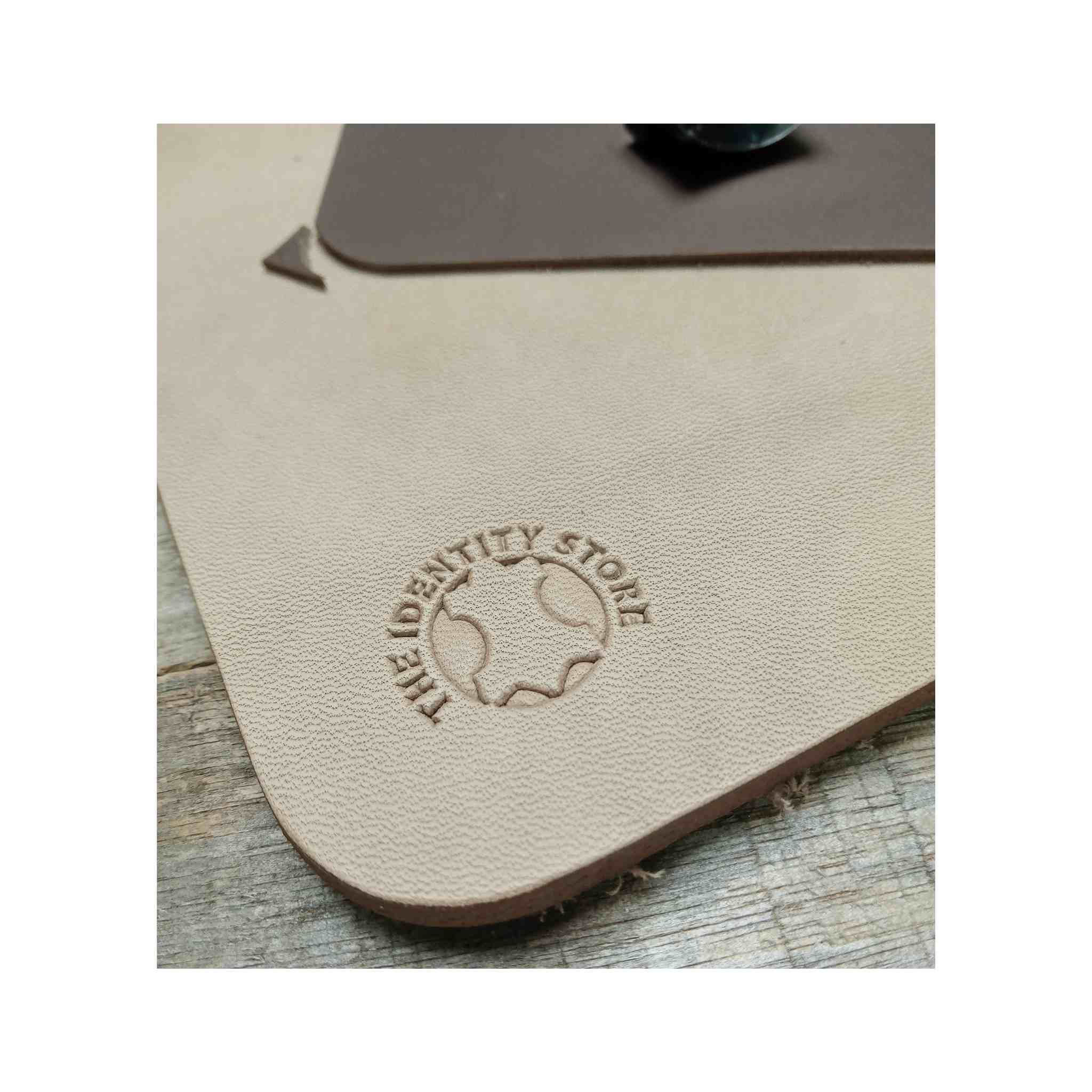 Close up of Identity Leather cutting and stropping pad mat for leathercraft small projects