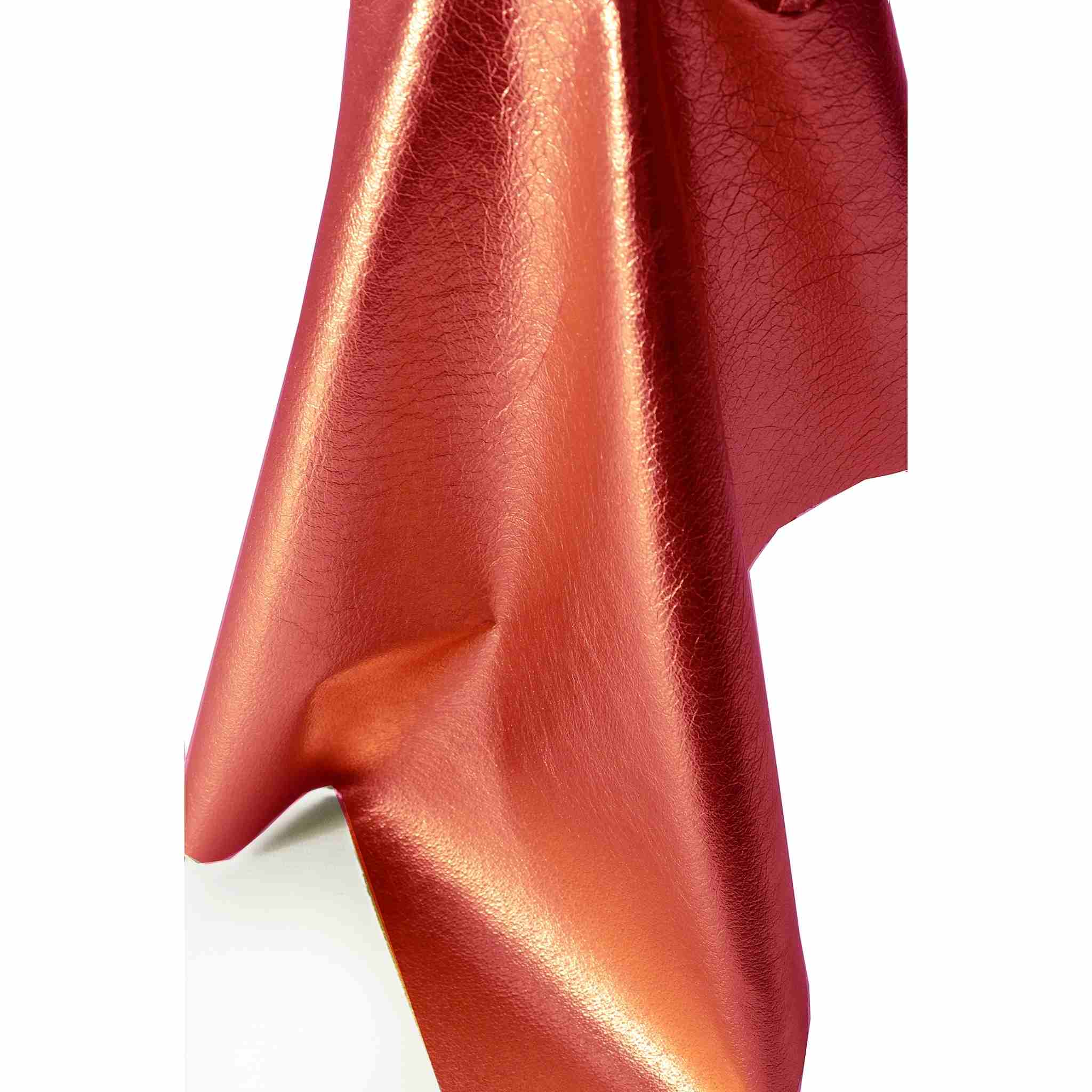 Red metallic foil leather with soft touch and good drape, ideal for machine sewing clothing, dance costume, jewellery, linings, bag making