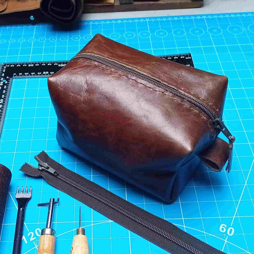 Load image into Gallery viewer, An excellent qualtiy eco-tannage cowhide leather in vintage brown . This leather is very durable and has a soft feel. Sold in A3, ideal for making pouches, zipped travel bags, wallets etc.
