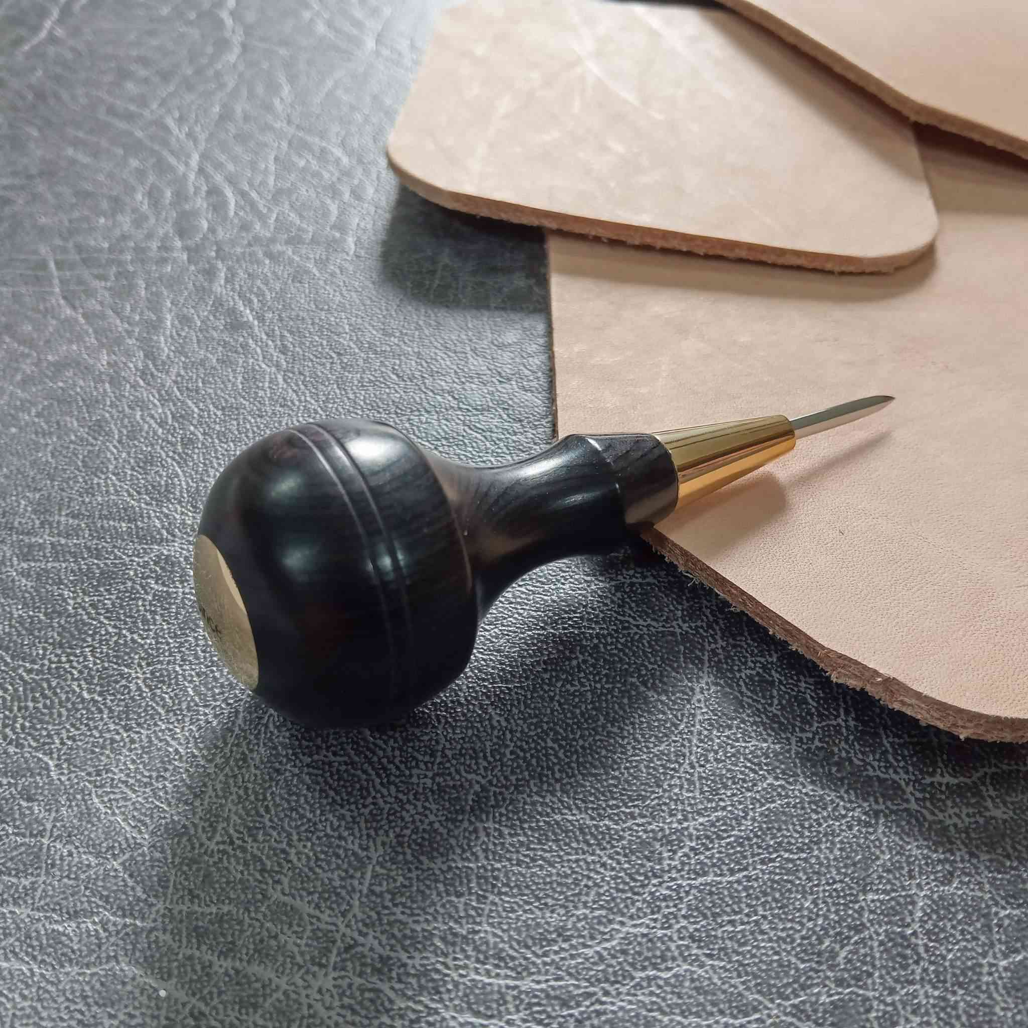 Beautifully made wood and hardened steel leather craft sharp awls in a choice of diamond (stitching) and round tips, ideal for marking up, and piercing all thicknesses of leather. 