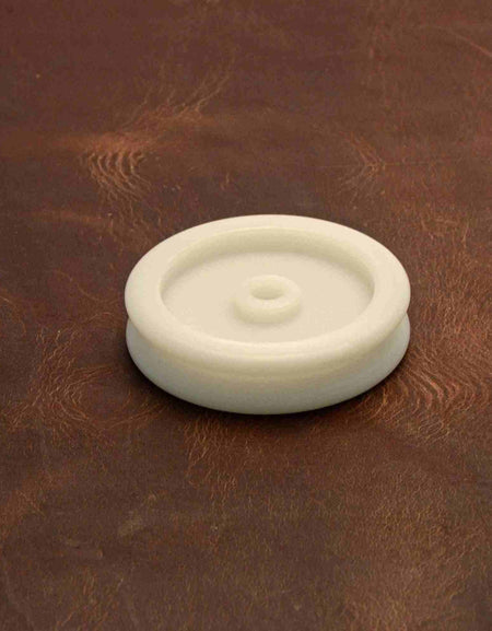 Nylon Edge Slicker from Identity Leathercraft, use with a drill bit to get smooth professional edges for belt making