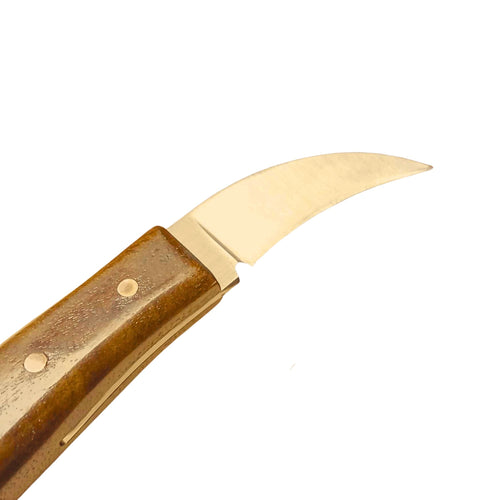 Load image into Gallery viewer, Handmade leathercraft clicker knife made by Shing Chan for Identity Leathercraft, D2 steel with sustainably sourced walnut handles and copper rivets.
