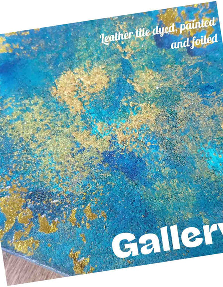 Close up showing tile leather dyed, painted and foiled for a splashback