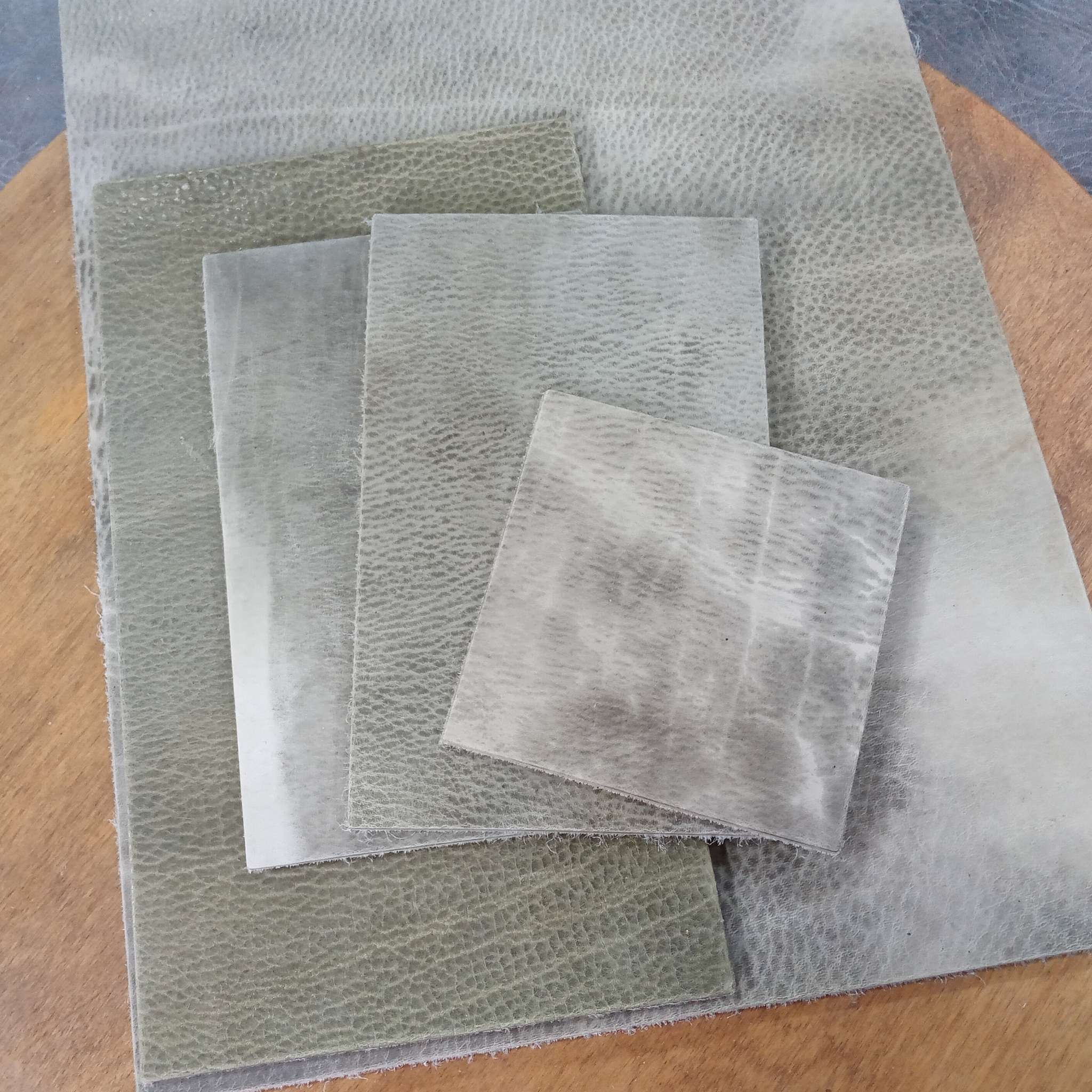 Pre-cut leather shapes for use as tiles or for heat-forming