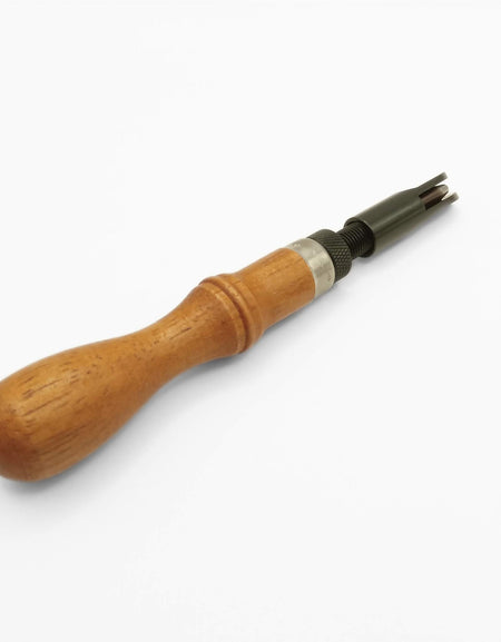 Wood handle adjustable 'u' shaped gouge.  For use with thicker and heavier weights of vegetable tanned leather this hand tool is ideal for gouging out deep channels to make room for the leather to fold over and in eg making boxes/cases from leather, or setting creases and folds in satchels and bag making.