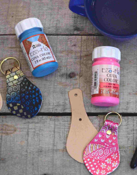 Decorating leather keyrings with paint and pens