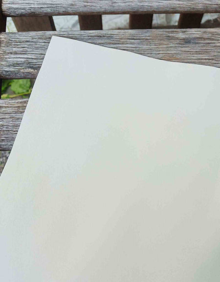 Cut piece of lovely creamy white eco sourced leather for craft