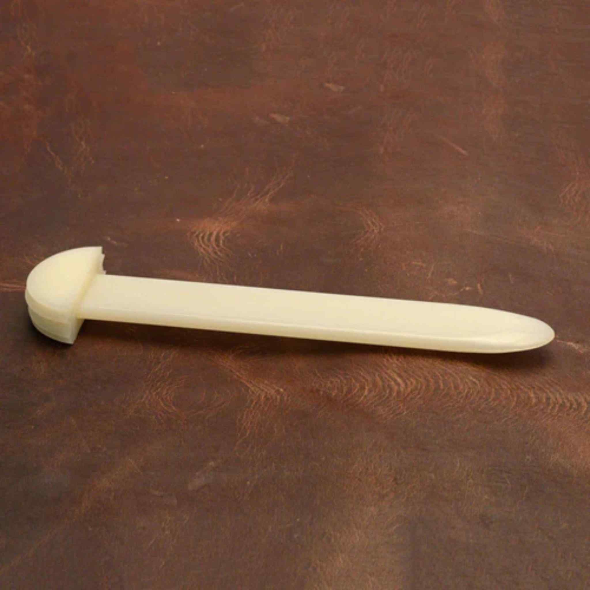 Hard plastic bone folder with rounded ends for smoothing and creasing leather and edges , leatherworking tool 