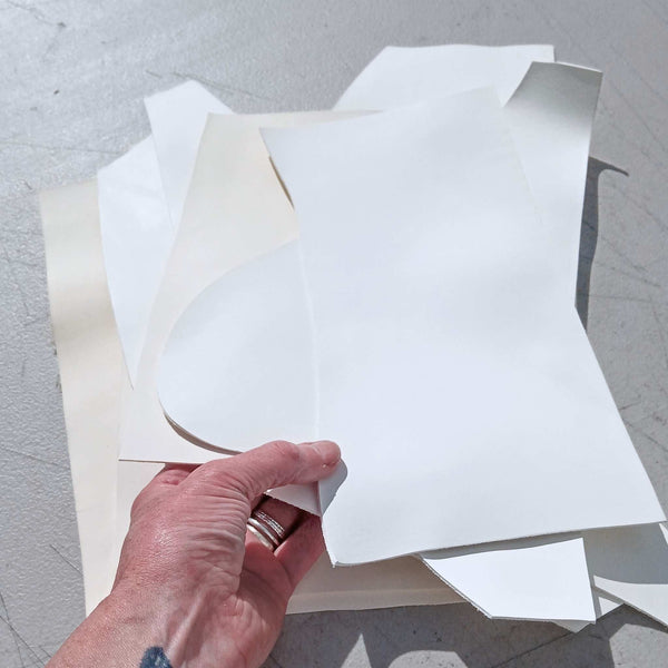 Pack of creamy white leather pieces for leather craft, marbling, wallet making, eco friendly leather