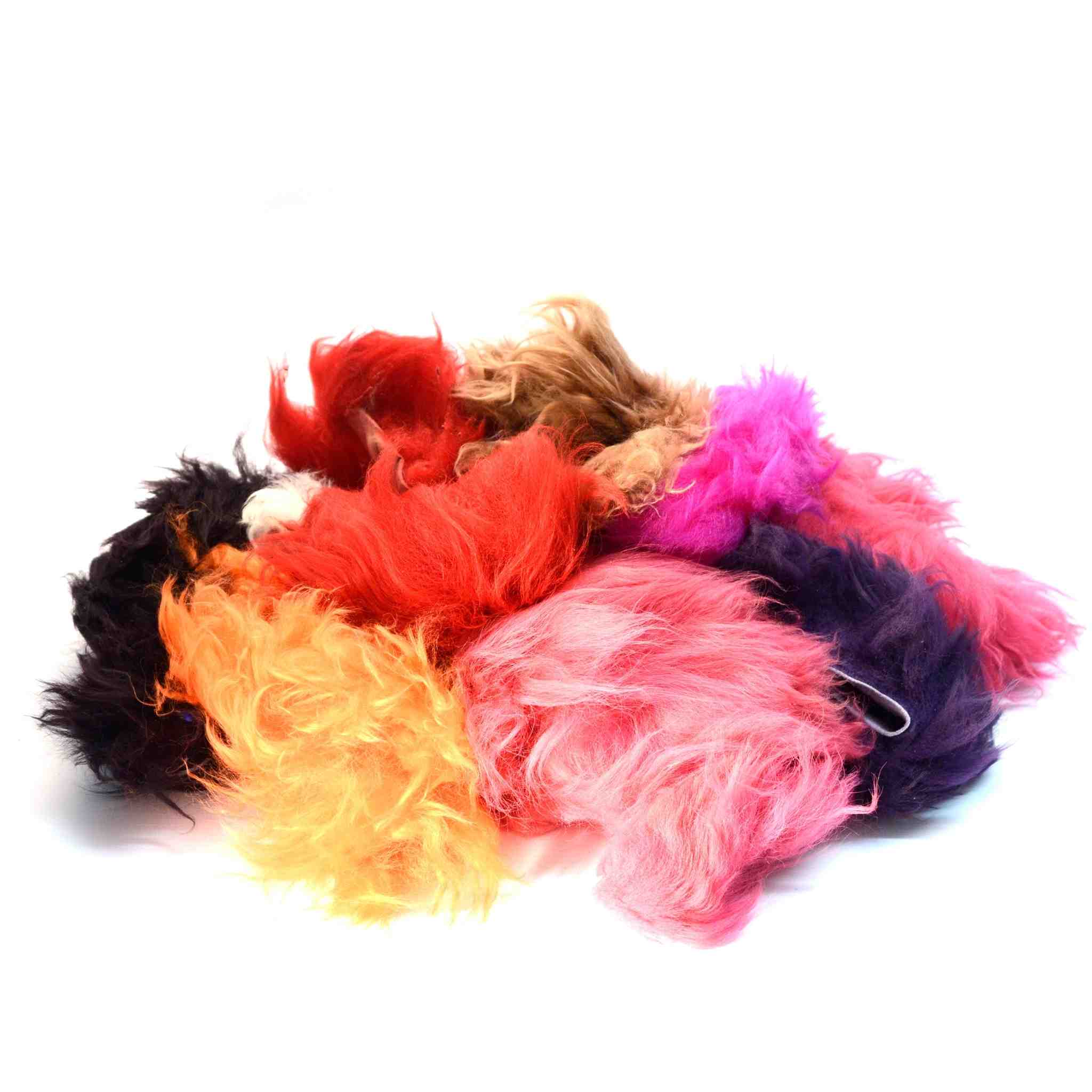 Bundle of coloured fluffy sheep skin wool pieces for buffing, stuffing and craft