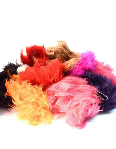 Bundle of coloured fluffy sheep skin wool pieces for buffing, stuffing and craft