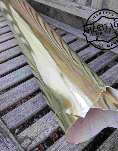 Lightweight veg tanned, heritage UK tanned goat leather with a gold metallic foil.  Ideal for small leathercraft projects, bags, costume and more.