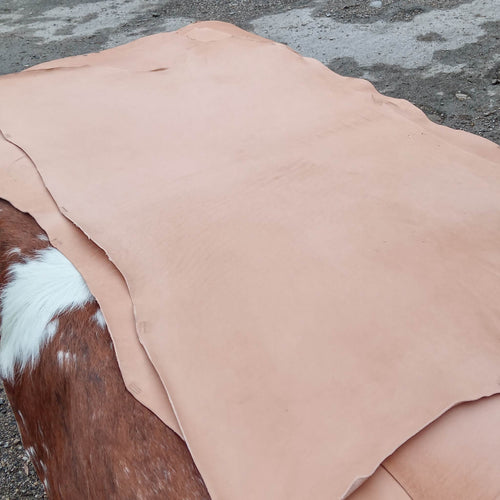 Load image into Gallery viewer, Authentic, heritage UK tanned leather for a more mellow feel. It has subtle characteristics and will dye, colour and polish to give a lovely effect.  This leather can be dyed, stamped and tooled, and wet formed. 
