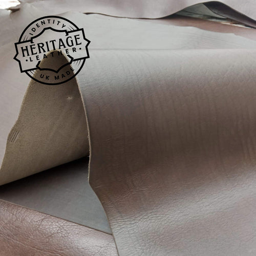 Load image into Gallery viewer, softer mellow type cowhide type leather in butts or short backs. Long lengths, a dark Bourneville Brown in colour.

