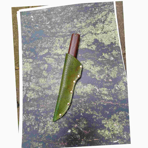 Load image into Gallery viewer, Leather Knife sheath photographed on a moss printed leather backdrop from Identity printed craft A3 leather selection
