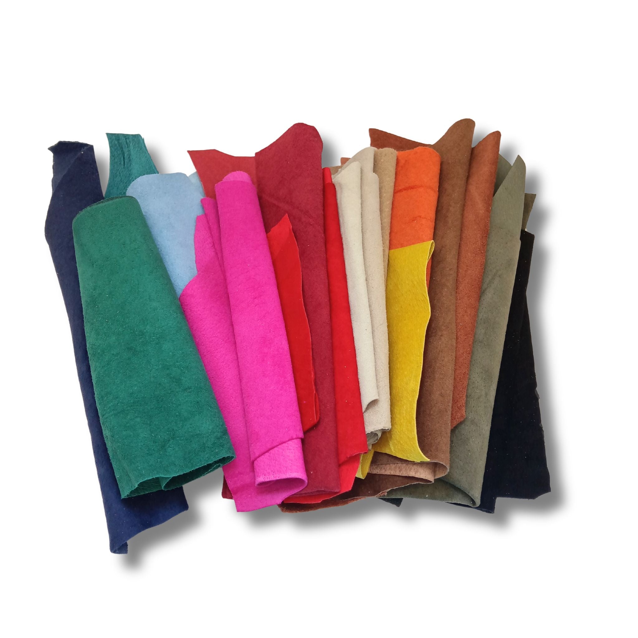A bag of coloured soft suede leather pieces, hand sized or larger, some narrow and long.