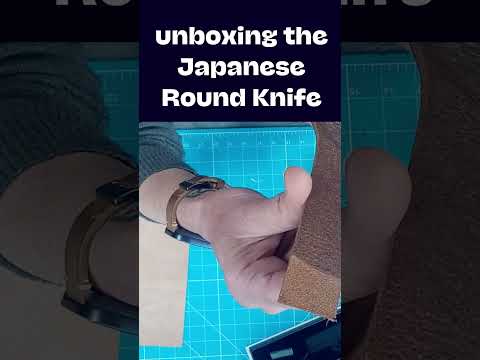 Load and play video in Gallery viewer, Unboxing the Japanese rounded knife - video short
