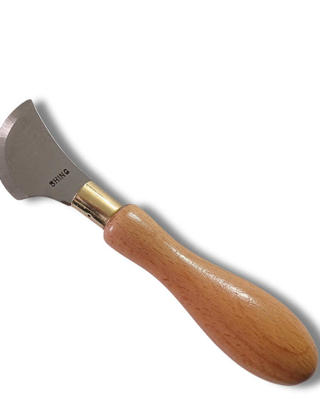 Leather cutting knife with quarter moon head, and hard wood handle, steel blade, hardened by traditional methods, with a razor ground edge. Made in the UK