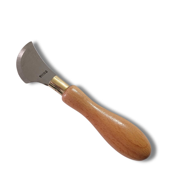 Leather cutting knife with quarter moon head, and hard wood handle, steel blade, hardened by traditional methods, with a razor ground edge. Made in the UK