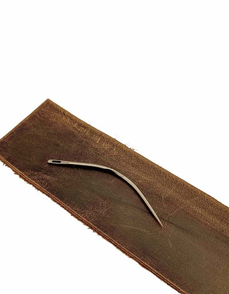 This strong curved needle has a wide awl type blade and is ideal for leather repairs on shoes, boots, for leather box-making and butt stitching, as well as saddlery and upholstery.