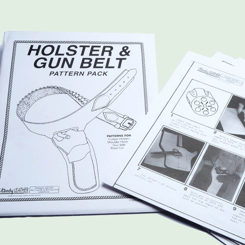 Load image into Gallery viewer, Make your own leather gun holster and belt with this paper pattern pack -Ideal for re-enactors, TV and film costume makers, and western enthusiasts. The pack includes paper pattern templates for a holster, pistol caddy, belt and shoulder holster.
