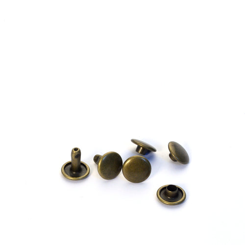 Load image into Gallery viewer, Medium Antique Brass Double Cap Rivets from Identity Leathercraft
