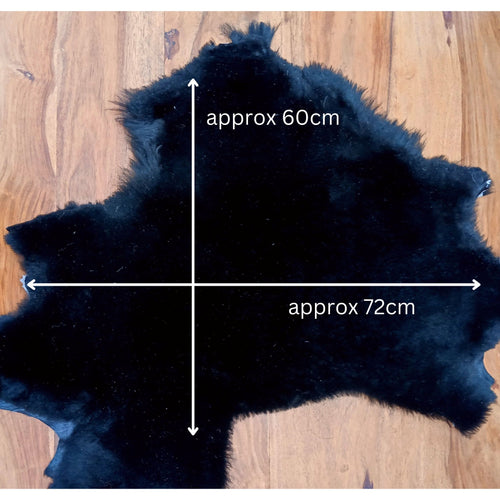 Load image into Gallery viewer, Luxury remnant sheepskins to show approximate sizes
