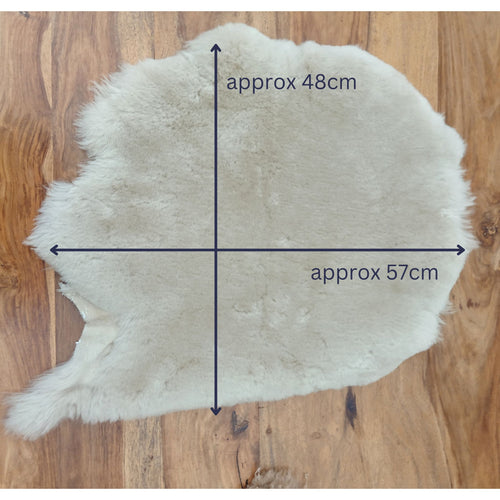 Load image into Gallery viewer, Luxury remnant sheepskins to show approximate sizes
