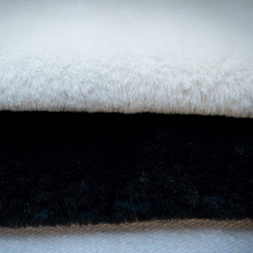 Load image into Gallery viewer, Natural wool sheepskin, with a short pile making them ideal for use as rugs, dog blankets, shoe, boot, or glove linings. They also make a good padded lining for making gadget cases.

